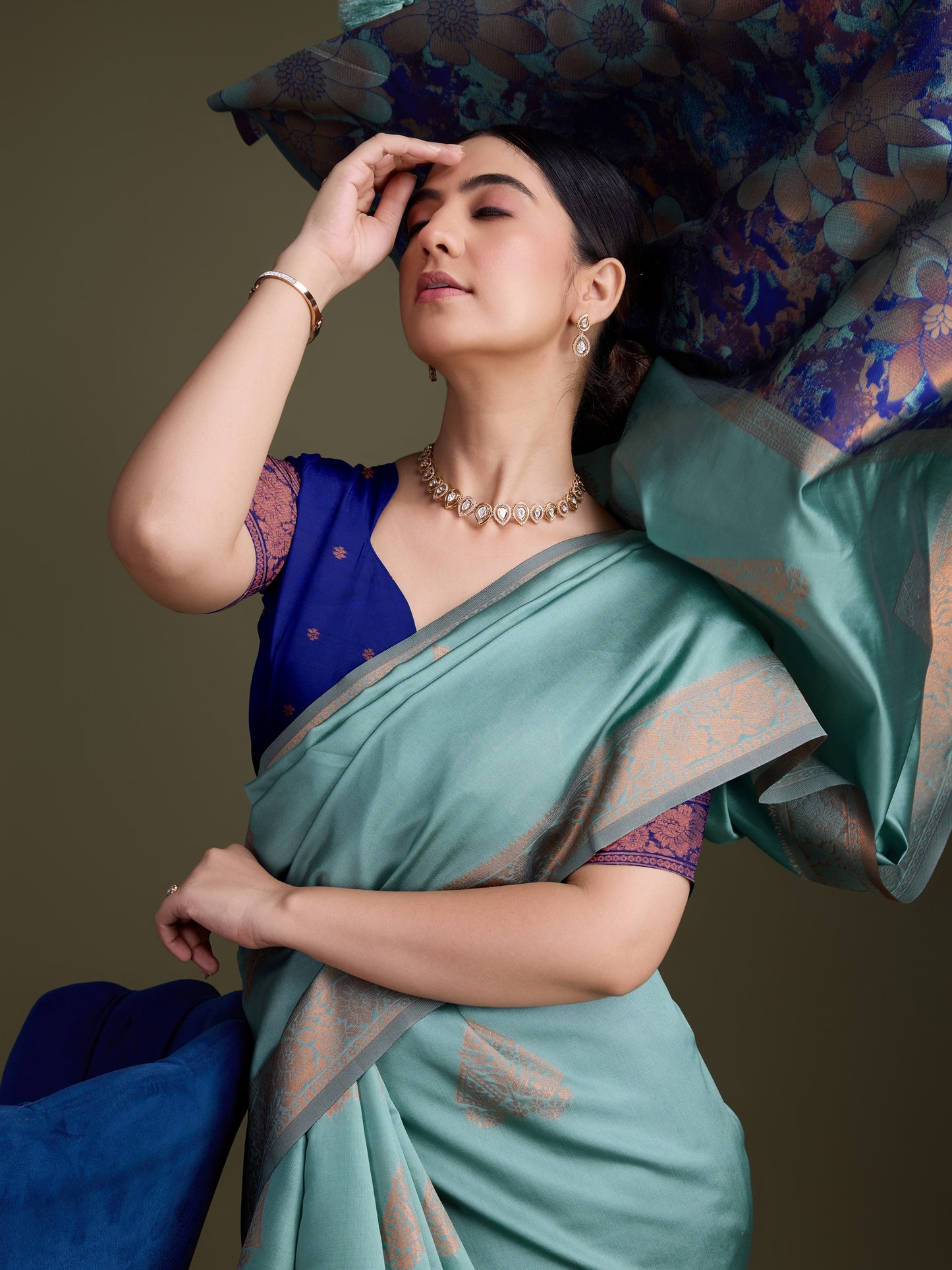 Shiny Dark Green Soft Banarasi Silk Saree with Fancy Digital Woven Pallu & Navy Blue Blouse