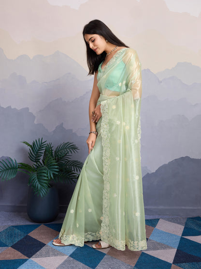 Elegant Pastel Green Gold-Infused Trending Twill Saree