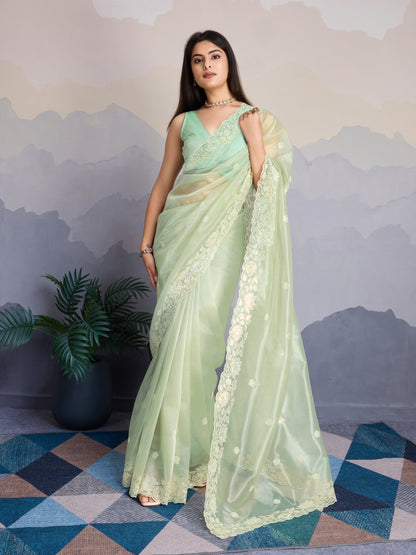 Elegant Pastel Green Gold-Infused Trending Twill Saree