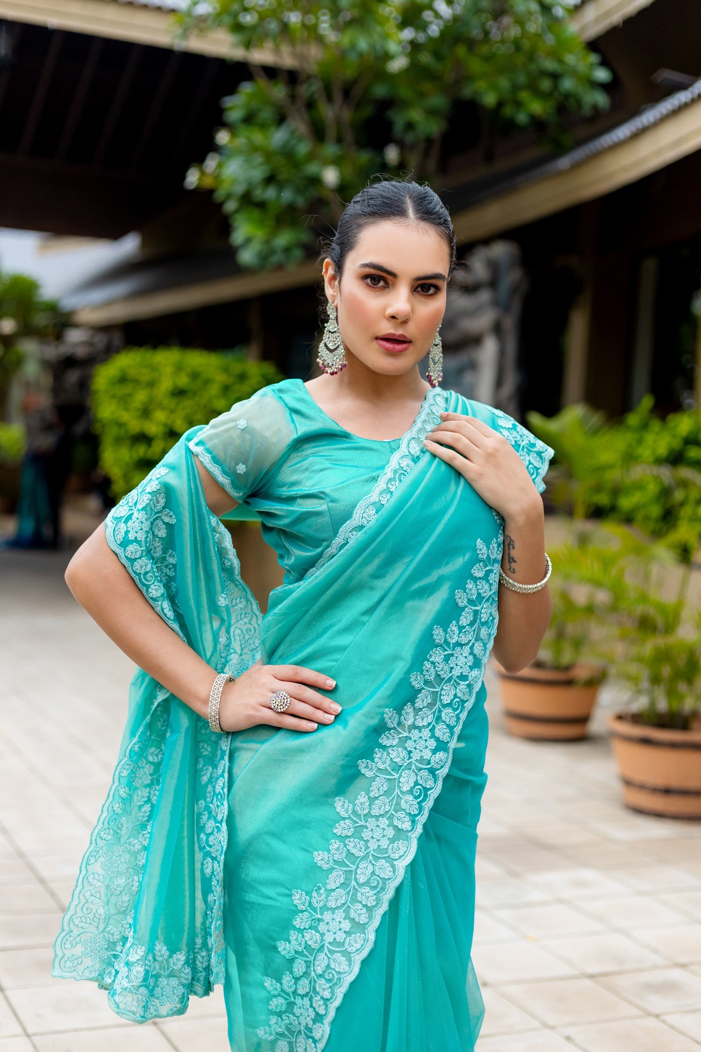 Green Gold-Infused Twill Saree with Grand Patta Floral Embroidery