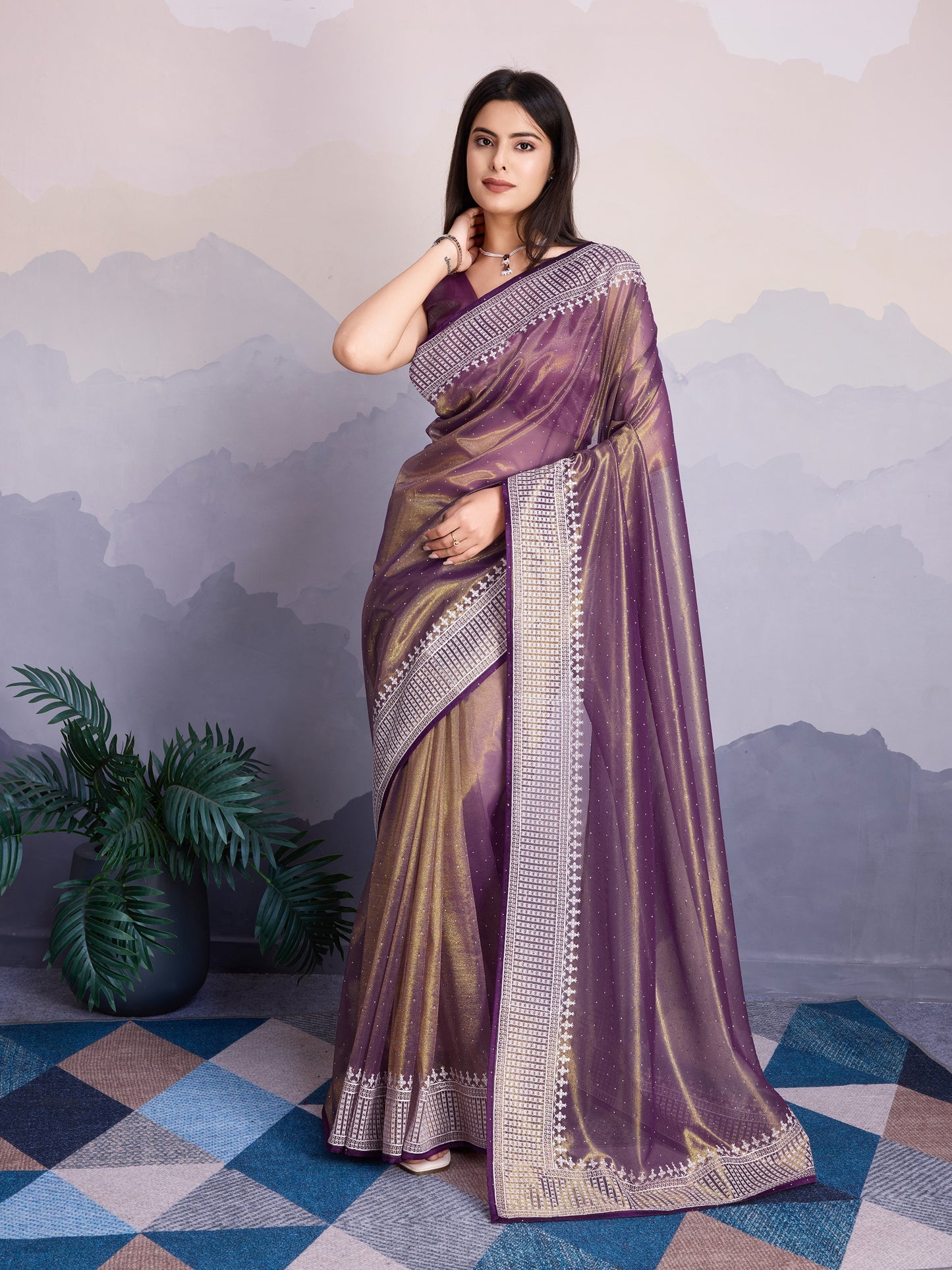 Maharani Style Gold Infused Twill Net Saree in Wine