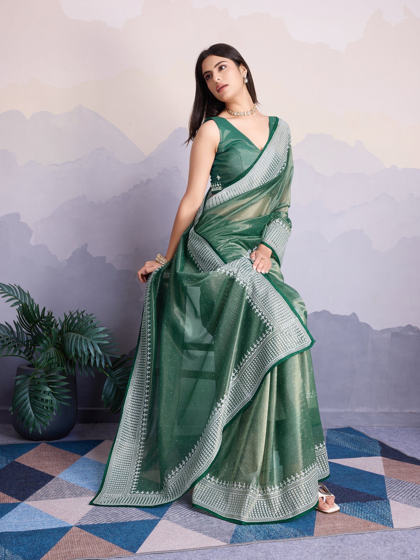 Maharani Style Gold Infused Twill Net Saree in Shiny Green