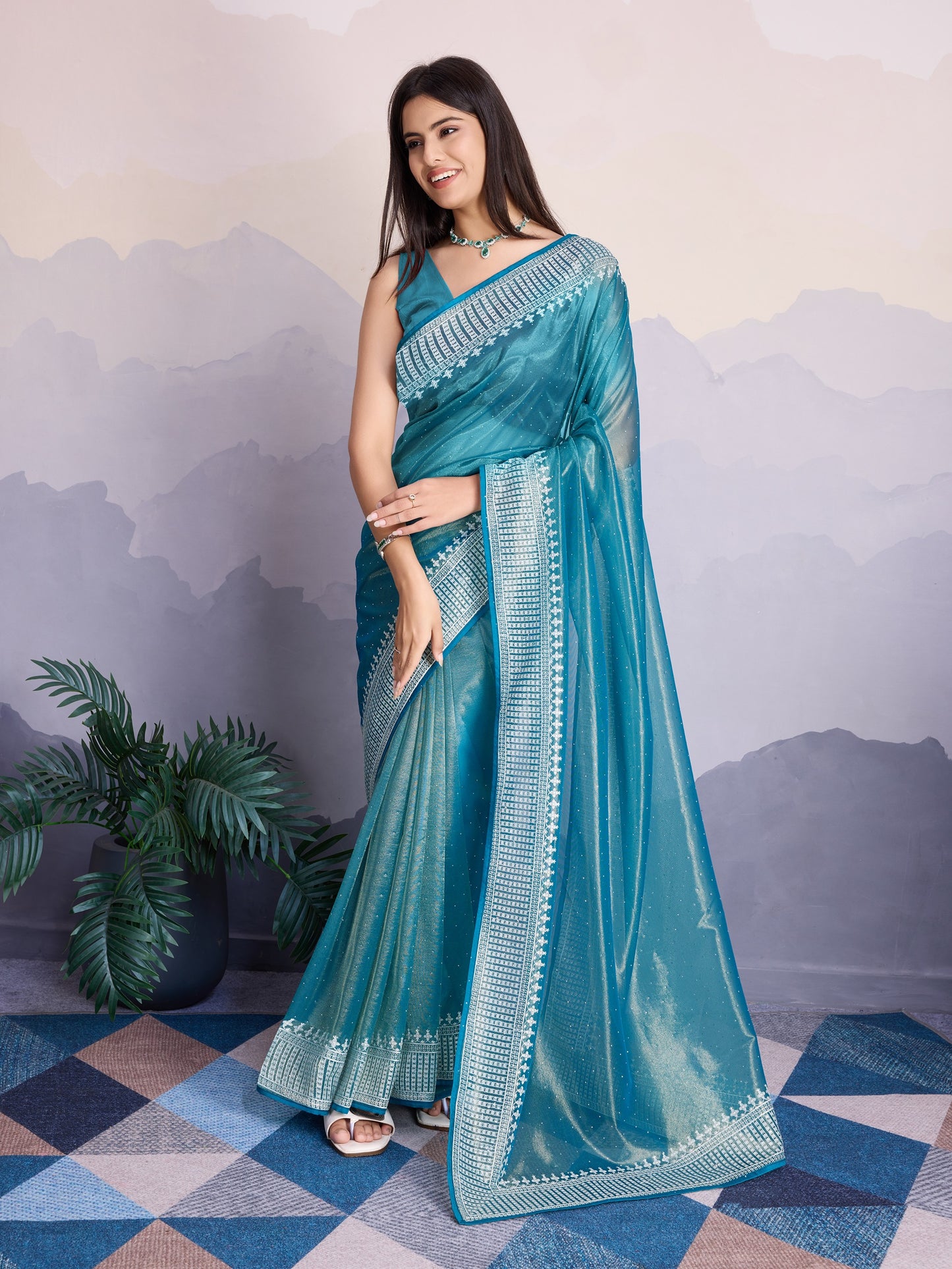 Maharani Style Gold Infused Twill Net Saree in Ocean Blue