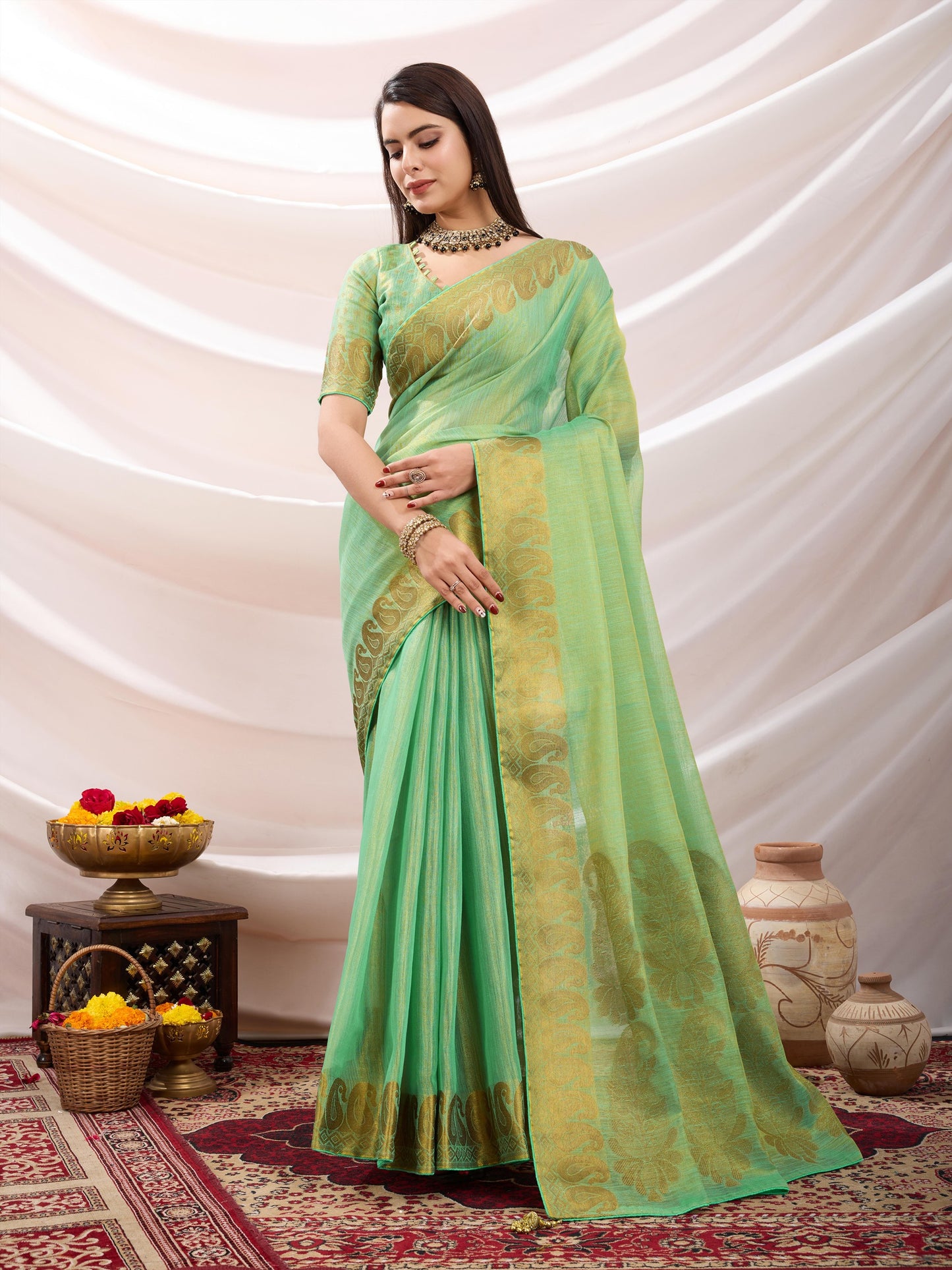 Pastel Green Linen Tissue Saree with Black Thread & Zari Weaving – Designer Blouse & Tassels